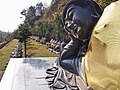 Nirvana statue, or Reclining Buddha, at Manbulsa is made of brass and is 43 feet long and 13 feet high. It is believed that touching Buddha's feet in a pious manner brings good fortune. Manbulsa (Ten Thousand Buddhas Temple), in the Manbul Mountains, is a Buddhist Temple that has considerably more than Ten Thousand Buddhas" represented throughout this new sprawling temple complex.