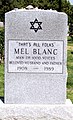 The epitaph on voice actor Mel Blanc's tombstone