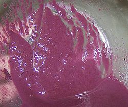 Dead yeast cells can leave wine cloudy, while active yeast may trigger further fermentation. Merlot wine lees after fermentation.JPG