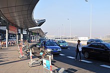 Exterior of the airport, At Shanghai Hongqiao Airport (SHA)…