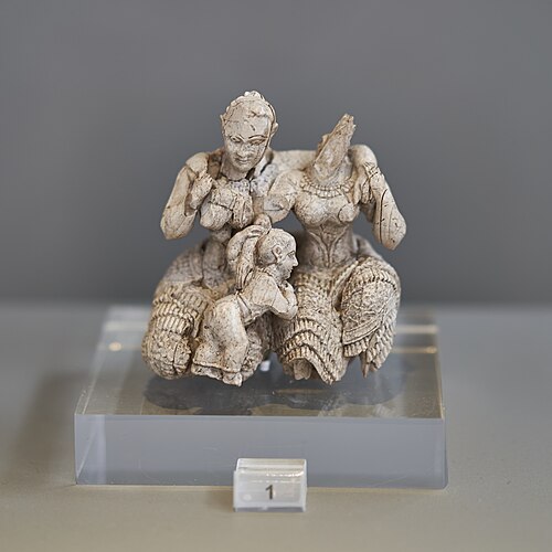 Figurine, known as the "Ivory Triad", found by Wace on the citadel of Mycenae in 1939, called "the most remarkable of all Mycenaean ivories" by Waterh