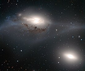Галактика NGC 4435 (внизу справа) и NGC 4438, VLT