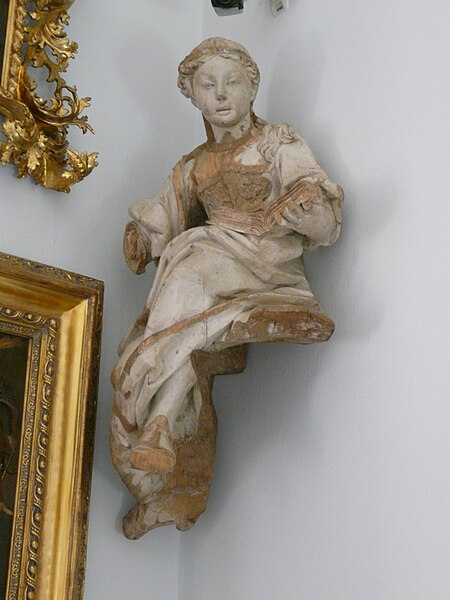 File:National Museum in Poznan - unknown statue with a book.JPG