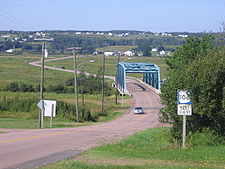 Route 106 crossing the Memramcook River floodplain in southeastern New Brunswick. NewBrunswickRoute106.jpg