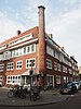 Etagewoningen in verstrakte Amsterdamse School-stijl