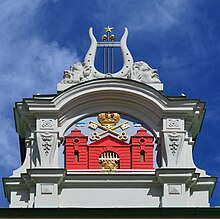 The coat of arms of Riga displayed on the Latvian National Theatre Riga Landmarks 67.jpg