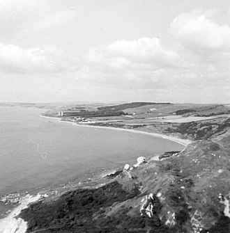 View of Ringstead Bay with the two large radar masts in the distance in 1966 Ringstead Bay, Dorset, England, 1966.jpg