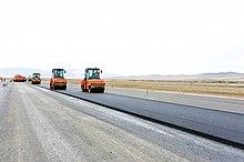 Rollers compact the asphalt layer. Buryatia, Russia Rollers compact the asphalt layer. Buryatia, Russia.jpg