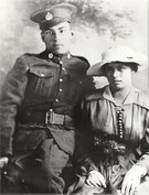 Black and white photo of Sarah and Jim Lavalley on their wedding day with Jim in military uniform