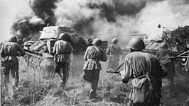 Soviet troops and T-34 tanks advancing during the Battle of Kursk Soviet troops and T-34 tanks counterattacking Kursk Voronezh Front July 1943.jpg