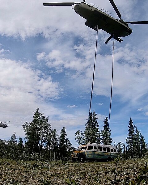 Alaska Army National Guard Soldiers airlifting the bus via a Boeing CH-47 Chinook on June 18, 2020