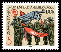 Postage stamp in honor of the 35th anniversary of the KdA depicting a Kampfer swearing-in ceremony. Stamps of Germany (DDR) 1988, MiNr 3177.jpg