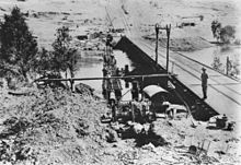 Kholo main pipeline being laid, Brisbane River at Mount Crosby, 1922 StateLibQld 1 136458 Kholo main pipeline being laid, Brisbane River at Mount Crosby, 1922.jpg