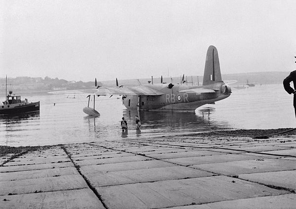 Sunderland II W3983/RB-R of No 10 Squadron RAAF, about to be brought out of the water at Pembroke Dock, 3 October 1941. Neyland is the headland on the