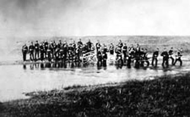 Halifax Provisional Battalion fording a stream near Swift Current, District of Assiniboia, 1885