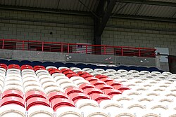 Away fan stickers, some covered over by Hull KR's own, in the Colin Hutton North Stand at Sewell Group Craven Park, Kingston upon Hull.