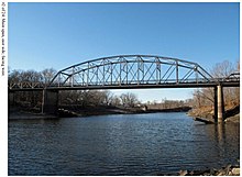 Turley Bridge #K0236 on Lamine River built in 1933 & replaced in 2014; Main Span East Side Facing West; photo taken in 2013 by Karen L. Daniels, Historian for the State of Missouri Department of Transportation Department MoDOT. Note the large remnants of the old 1907 Turley Bridge just upstream a bit on the left bank Turley Bridge Main Span east side facing west MODOT.jpg