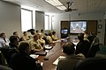 The U.S. Center for Aviation Technical Training holding a videoconference with Rear Adm. Kevin Moran, December 2003.