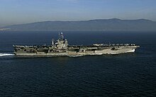 USS George Washington US Navy 040201-N-5319A-003 The nuclear powered aircraft carrier USS George Washington (CVN 73) and the Air Wing of Carrier Air Wing Seven (CVW-7) transit the Straits of Gibraltar.jpg