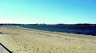 Wollaston Beach, with the Boston skyline in the background. The beach was named after Wollaston Wollybeachboston.jpg