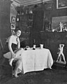 Woman sitting on table by Robert Wilson Shufeldt 09.jpg