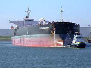 Young Lady & Smit Polen (IMO 8521701) leaving Port of Rotterdam, Holland 04-Aug-2007.jpg