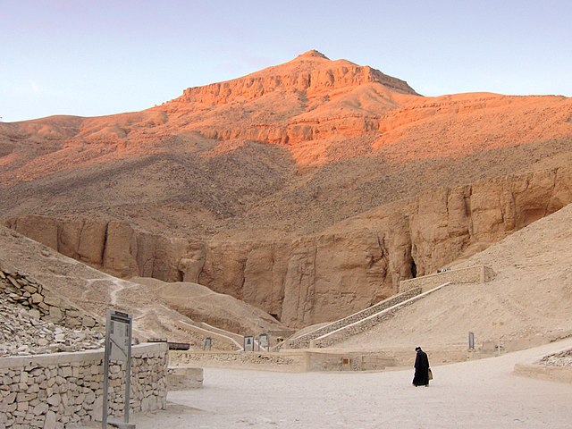 Al-Qurn dominates the valley.