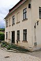 Čeština: Kostel svatého Vavřince v Černé Hoře, okres Blansko. Fara před kostelem. Pohled na průčelí od severu. English: Church of Saint Lawrence in Černá Hora, Blansko District, Czech Republic.