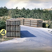 Ammunition at the Chibana Ammunition Depot, February 1969 18-60-2 Artillery rounds Chibana Ammunition Depot February 1969.jpg