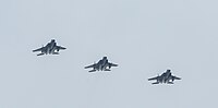 A formation of three F-15C/D Eagles overhead Kadena Air Base in Okinawa, Japan. The aircraft are assigned to the 18th Wing.