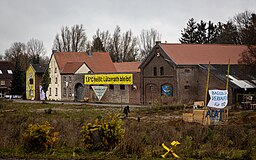 Lützerath 2021, en ockuperad bondgård med banderoller.