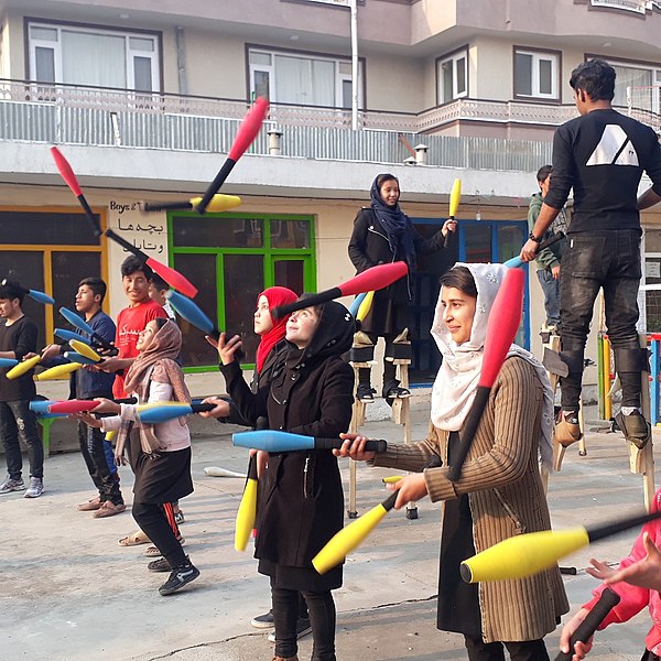 Children performing juggling as part of the International Jugglers' Association supported Mobile Mini Circus for Children