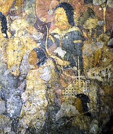 The Buddhist paintings of Ajanta, dated to c. 460-480, are contemporary of the end of the Kidarite invasion of northwestern India, and some scenes probably received the influence of the Kidarites or the Hephthalites after them. Ajanta Cave 17 horseman holding recurve bow.jpg