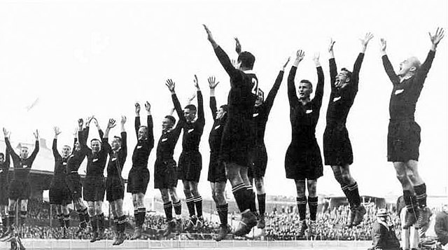 The All Blacks at the climax of their haka before a 1932 test against Australia
