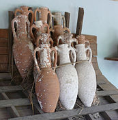 Bronze Age amphorae from shipwrecks near Bodrum, Turkey, with rack and roping device illustrating how they might have been kept from shifting