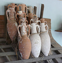 During antiquity, amphorae like these were used to store wine and sealing wax made it possible to age the wine. Amphorae stacking.jpg