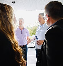 Esposito with Andrew Scheer in 2019. Angelo Esposito and Andrew Scheer in Laval (48687823188) (cropped).jpg