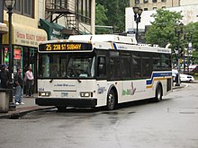 A Bee-Line Bus in Getty Square, heading to the Bronx to connect to the Nereid Avenue New York City Subway station. Bee Line Orion 7 hybrid 204.jpg