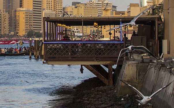 An arabic bar on the banks of Dubai Canals]]