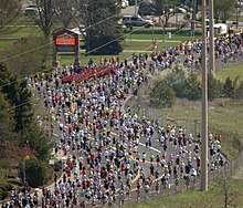 Lopers die deelnemen aan Spokane's jaarlijkse Lilac Bloomsday Run