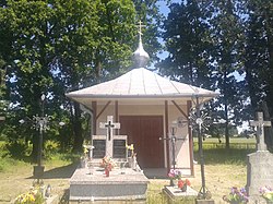 Cemetery in Bokinka Pańska with the church of St. Nicholas