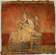 A later vivid Roman representation of a woman playing the kithara, fresco painting, c. 30-40 BC Boscoreale fresco woman kithara.jpg