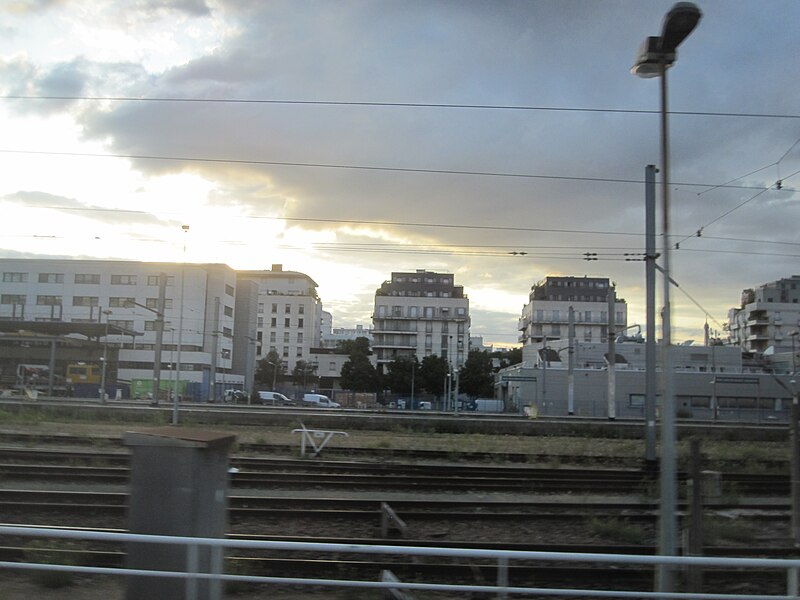 File:Buildings overlooking Train Tracks 3.jpg
