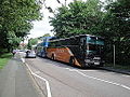 Several buses parked up in Wellington Road, Newport, Isle of Wight just before the end of the school day ready to take students home. Some buses had driven further along the road and parked in the bus layby at Christ the King College (seen here), however due to the very large catchment area of the school, with students being carried from across the Island, a large number of buses are required, and so do not all fit into the layby outside the school. Those that don't park up and wait further down the road as seen here.