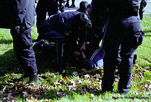 A Caledonian protester is arrested by OPP officers after attempting to breach the police line near the site of the disputed land on October 15 CaliRally7 150dpi.jpg