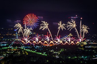 Fireworks in Canberra, Australia, in 2017 with Parliament House to the left.