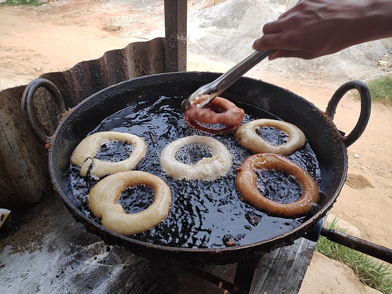 File:Cooking Sell Roti.jpg