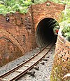 A brick-lined tunnel on the Driving Creek Railway in 2004