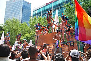 Gay-rights parade float with Aztec eagle-warrior theme