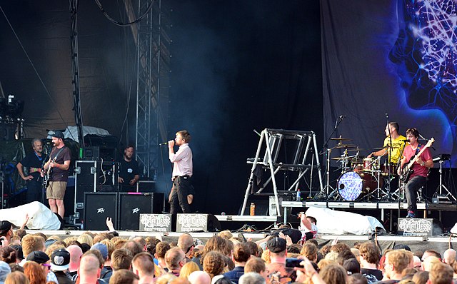 Enter Shikari performing in 2015. From left to right: Rory Clewlow, Rou Reynolds, Rob Rolfe and Chris Batten.